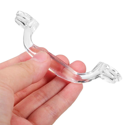 Hand holding a crystal-clear handle from Six Pack Plastic Cabinet Handles And Drawer Pulls For Doors Modern Kitchen And Dresser Hardware Replacement Crystal Style Pulls For Cabinet Doors Sturdy Durable And No Fuss Easy Install Sleek And Functional Hardware Update