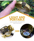 All In One Portable Hiking Compass With Carabiner For Camping And Backpacking shown in hand and opened for easy access with box