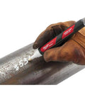 Gloved hand using Bulk White Paint Markers With Durable Acrylic Nib Pack Of 12 For Writing On Rough Hot Surfaces Water And UV Resistant Up To 300F