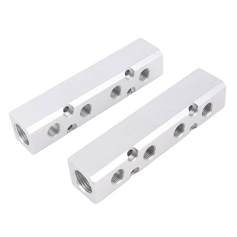 Beefy Aluminum Air Manifold For Four Way Six Port Pneumatic System With One Quarter Inch NPT Output And One Half Inch NPT Supply Heavy Duty Air Distribution Block For Industrial Automation, aluminum manifold shown at angle