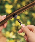 Installing dripper on tubing, Drip Irrigation Landscaping Kit With Drippers Micro Bubblers And Micro Sprays For Gardens And Flower Beds