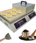 Image of a Commercial Electric Griddle Featuring Pure Copper Plates For Effortless Flipping Of Japanese Souffle Pancakes And Pillowy Dorayaki Sweets Smart Temperature Control For Top Shelf Kitchen Hustlers And Stands with pancakes and a spatula.