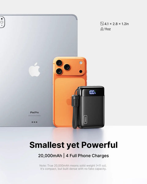 Ultra Compact 20000mAh Power Bank Featuring Dual USB Cables And Secure Lanyard Offers Beast Mode 22.5W Fast Charging beside an iPad and orange phone.