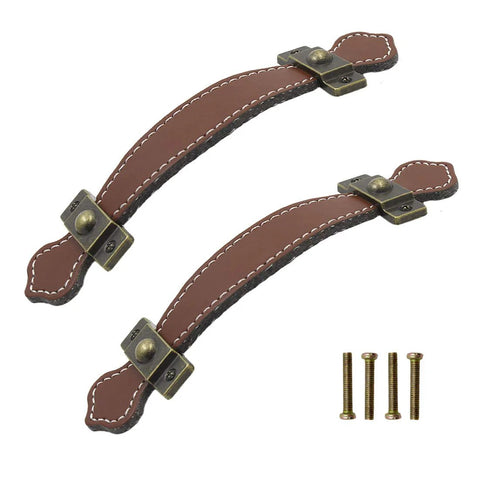 Two brown leather pull handles with mounting screws, from Six Retro Style Leather Furniture Pull Handles Set 6.3 Inch Length for Drawers Cabinets and PU Suitcases