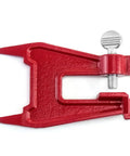 Stump Vise For Chainsaw Sharpening, red color, durable metal clamp for securing chainsaws, adjustable for all chain sizes.