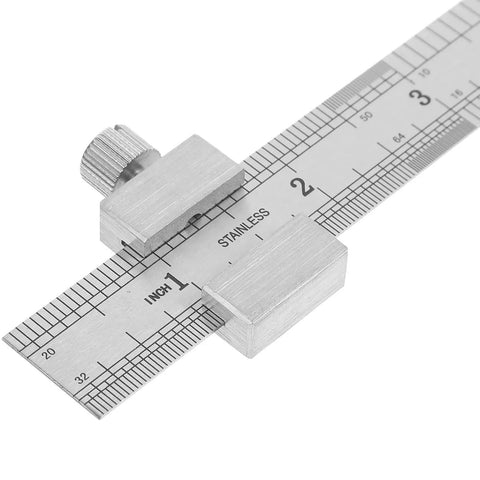 Stainless Steel Ruler With Clip Stopper showing metric and inch scales, precision machinist straight edge visible in close-up.