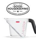 Angled 2 Cup Measuring Cup With Easy Read From Above Measurements, BPA Free Tritan Renew, with non-slip handle, shown side view.