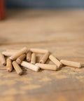 1/4-Inch Fluted Wood Dowel Pins, 72 Count Pack, Straight-Grain Hardwood Dowels For Rock-Solid Joints, Chamfered Ends For Easy Insertion, Expands With Water-Based Glue For Tight Bond, FSC Ethically Sourced scattered on a wood surface.