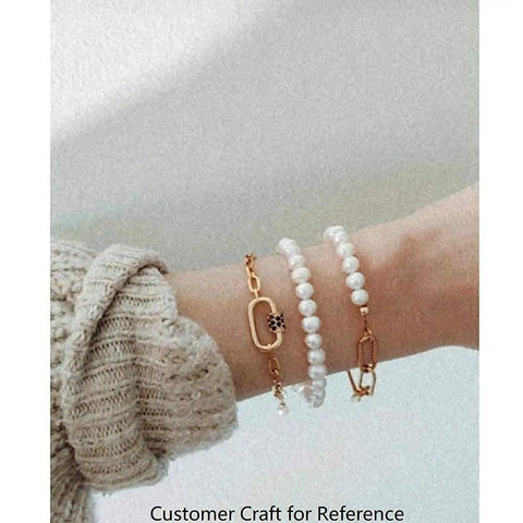 Person wearing pearl bracelets with Mixed Color Micro Pave Cubic Zirconia Carabiner Lock Charms, Oval Clasp, on wrist.