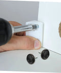 Installing Heavy Duty Furniture Levelers 20 Pack Adjustable Screw Feet on furniture with a screwdriver and black bases.