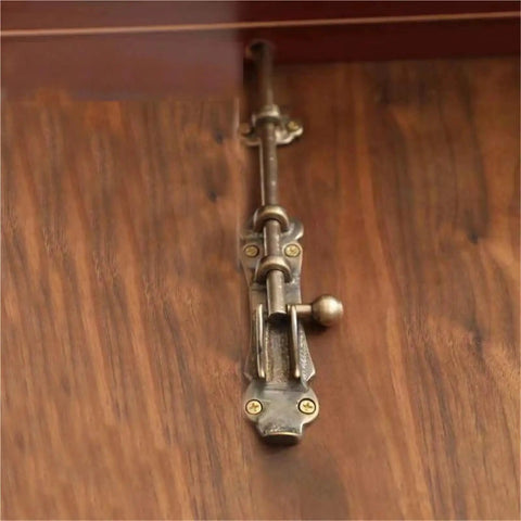 Rugged Solid Brass Slide Bolt Gate Latch With Bulletproof Flip Mechanism For Knockout Garden Door Security Pro Grade Exterior Hardware Kit With Fasteners on wooden surface.