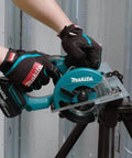 Game Changing 18V LXT Cordless Metal Cutter Shreds Steel Sheets Pipes Square Tubing And Unistrut 3600 RPM held by hands wearing gloves.