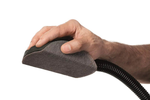 Hand using Dust Free Roundy Hand Sanding Block Kit with 6 Inch Sandpaper Discs, Hook and Loop Abranet mesh, and 13 ft vacuum hose