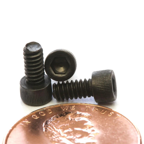 Tough As Nails Number 4 40 By Quarter Inch Socket Head Cap Screws featuring thermal black oxide coating, displayed with a penny.