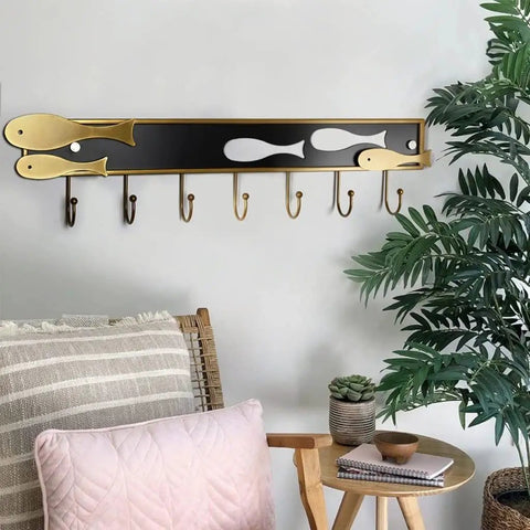 Creative Goldfish Wall Mount Coat Hook Built Tough Durable Metal Entryway Organizer hanging on wall with 7 hooks and goldfish design.