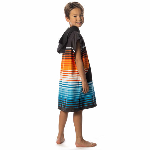 Child wearing Kids Hooded Changing Poncho Towel For Beach And Pool Microfiber Quick Dry Swim Poncho Soft Suede Like Fabric, Sunset Drift Small