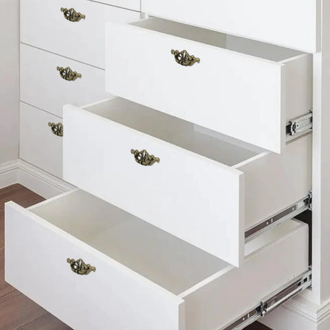 White dresser with open drawers displaying 2-Pack 6 Inch Antique Drawer Pulls With 3.43 Inch Hole Spacing Hollow Pattern Zinc Alloy Decorative Cabinet Handles
