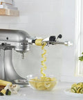Fruit And Vegetable Spiralizer Attachment For Stand Mixer Power Hub With 5 Quick Change Blades on kitchen counter, spiralizing zucchini