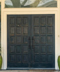 Dark wooden double doors with Heavy Duty Cast Iron Gate Handle 11.81 Inch Barn Door Pull With Vintage Rustic Farmhouse Charm