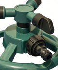 Close-up of green 360 Degree Automatic Rotating Sprinkler With 3 Nozzles Easy Setup, showing durable PP body and spray mechanism