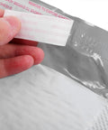 Close-up of self-seal strip on 100 Pack Bubble Envelope Mailers 15x18 Inches Plus 4cm Self Seal Waterproof Packaging Bags