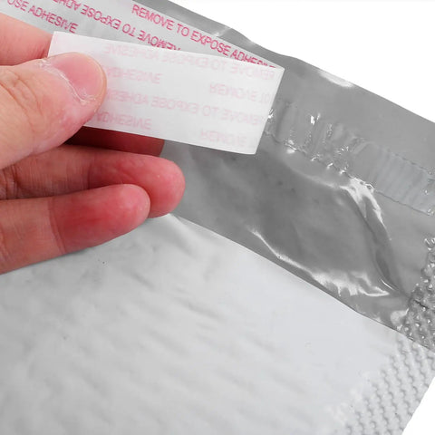 Close-up of self-seal strip on 100 Pack Bubble Envelope Mailers 15x18 Inches Plus 4cm Self Seal Waterproof Packaging Bags