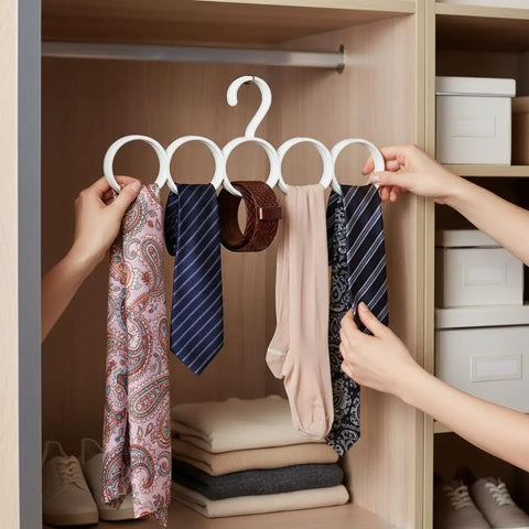 Slick Closet Organizer And Scarf Hanger That Crushes Your Morning Clutter With Wide Loops For Quick Belt Tie And Hijab Storage, displaying ties and scarves on rings.