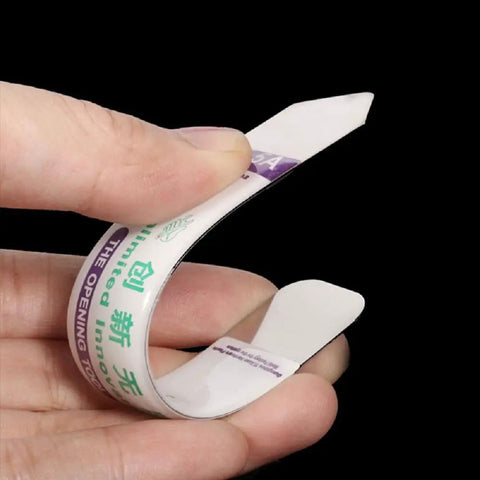Person holding one ultra-thin stainless steel pry tool from 10 Pcs Metal Flat Spudger Set For Phone And Tablet Repair.