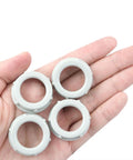 Legit Heavy Duty Three Quarter Inch Threaded Electrical Pvc Conduit Nuts And Insulated Wire Sleeves featuring four PVC conduit nuts in hand.