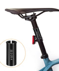 Aluminum Bike Seat Post Shim 22.2mm To 25.4mm 60mm Length Reduction Sleeve in use on a bicycle seat post highlighting conversion feature.