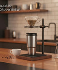 Adjustable Pour Over Coffee Stand Built From Premium Wood And Rock Solid Alloy Fits Travel Mugs Carafes Hassle Free Dripper Holder For Zero Mess Morning Brews with dripper above mug.