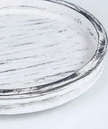 Close-up of the 14 Inch White Distressed Round Lazy Susan Real Deal Farmhouse Turntable showing its textured surface and edge.