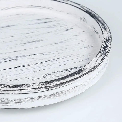 Close-up of the 14 Inch White Distressed Round Lazy Susan Real Deal Farmhouse Turntable showing its textured surface and edge.
