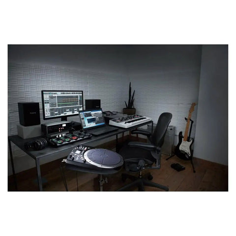 Studio setup with HPD-20 Digital Hand Percussion Instrument with 850 dope ready to play sounds on a desk with audio equipment