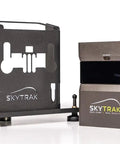 Metal Protective Case For SkyTrak Launch Monitor And Golf Simulator, Black, showcased beside SkyTrak device on white background