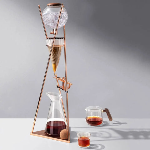 Top Tier Iced Coffee Maker And Cold Brew Drip Tower With 800Ml Borosilicate Glass Pitcher on a table, rust proof stainless base