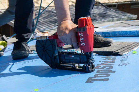 Heavy Hitter Pneumatic Cap Stapler Featuring A Rock Solid Three Eighths Inch Crown And Eighteen Gauge Design With Top Load Magazine for roofing application.