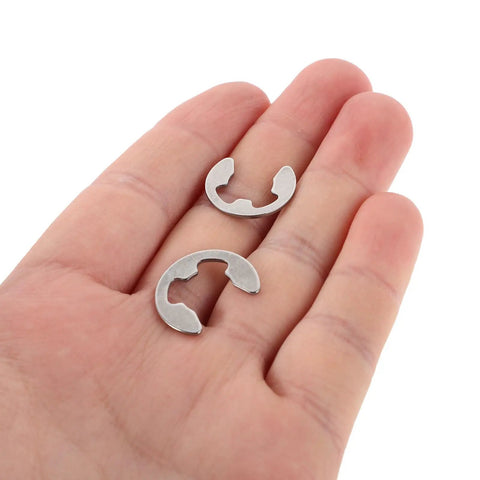 Stainless Steel Snap Retaining Clip Ring Set External Circlip Assortment Kit With Plastic Box For Easy Organization And Transport In Maintenance Tasks And Professional Projects Ten Pieces, two circlips in hand