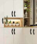 Modern kitchen with cabinets featuring 4Pcs Arcuate Cabinet Pulls 3.8 Inch Center To Center S Shaped Matte Black Zinc Alloy Drawer Pulls.