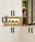 Arcuate Pulls S Shaped Cabinet Handles 5 Inch Center Matte Black Solid Zinc Alloy 4 Pack mounted on white cabinets