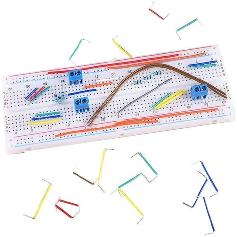 560 Piece Breadboard Jumper Wire Kit With 14 Lengths From 2mm To 125mm, on a white breadboard with color-coded wires.
