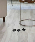 U Shaped Floor Glides For Hardwood Floors 48 Pack Chair Leg Caps With No Slip Ribbed Surface Snap On Open U Slot Design shown on floor