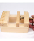 Top Shelf 2 Pack Mini Flat Pliers Vise Clamps For Woodworking Tables, Heavy Duty Cast Iron Hand Tools With Smooth Grip For Carving Engraving Projects And DIY Bench Work You Won't Believe! Detailed view of a wooden clamp with screw mechanism.