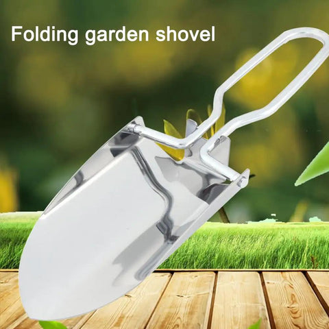 Mini Folding Shovel With Carrying Pouch for Camping And Hiking, stainless steel trowel shown open on wooden surface