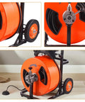 Heavy Duty Auto Feed Drain Auger Snake Machine Packs Four Swappable Cutters, featuring orange drum and black frame.