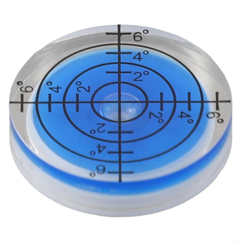Round Bubble Level for Precision Measuring and Alignment Tasks with clear blue liquid and precision machined markings.