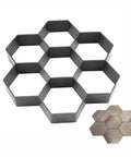 Durable Concrete Molds For Walkways And Patios Reusable Paver Molds For DIY Garden Paths Hexagonal Stepping Stone Molds For Yard And Lawn Pavement Premium PP Material Long Lasting And Easy To Use, shown in hexagonal shape, made from black PP material.