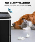 Scooper Free Nugget Ice Maker On Your Countertop Drops Soft Chewy Ice Straight Into Your Glass In Under Ten Minutes Plus Cleaning Tabs, with dog and cat nearby.