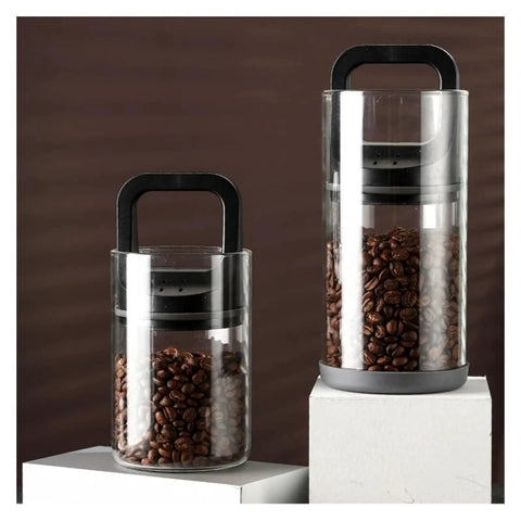 Premium Vacuum Sealed Clear Glass Coffee Bean Canister With Secure Airtight Lid, two sizes displayed with coffee beans inside.