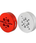 Red and silver circular dovetail plate adapter for telescope and camera mounts, sturdy metal for astrophotography setup.